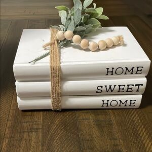 White Decorative Books with Beads and Greenery